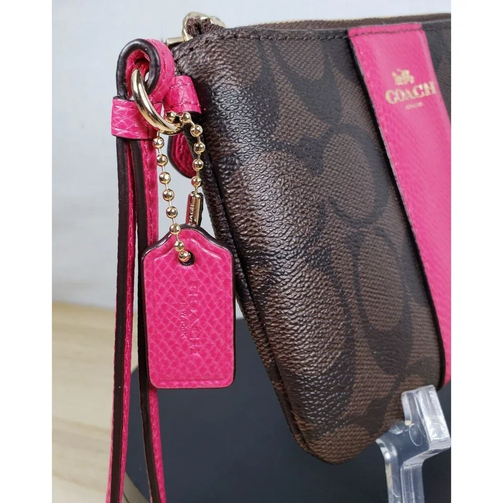 COACH Corner Zip Wristlet In Dark Brown Signature Leather w/ Hot Pink Stripe